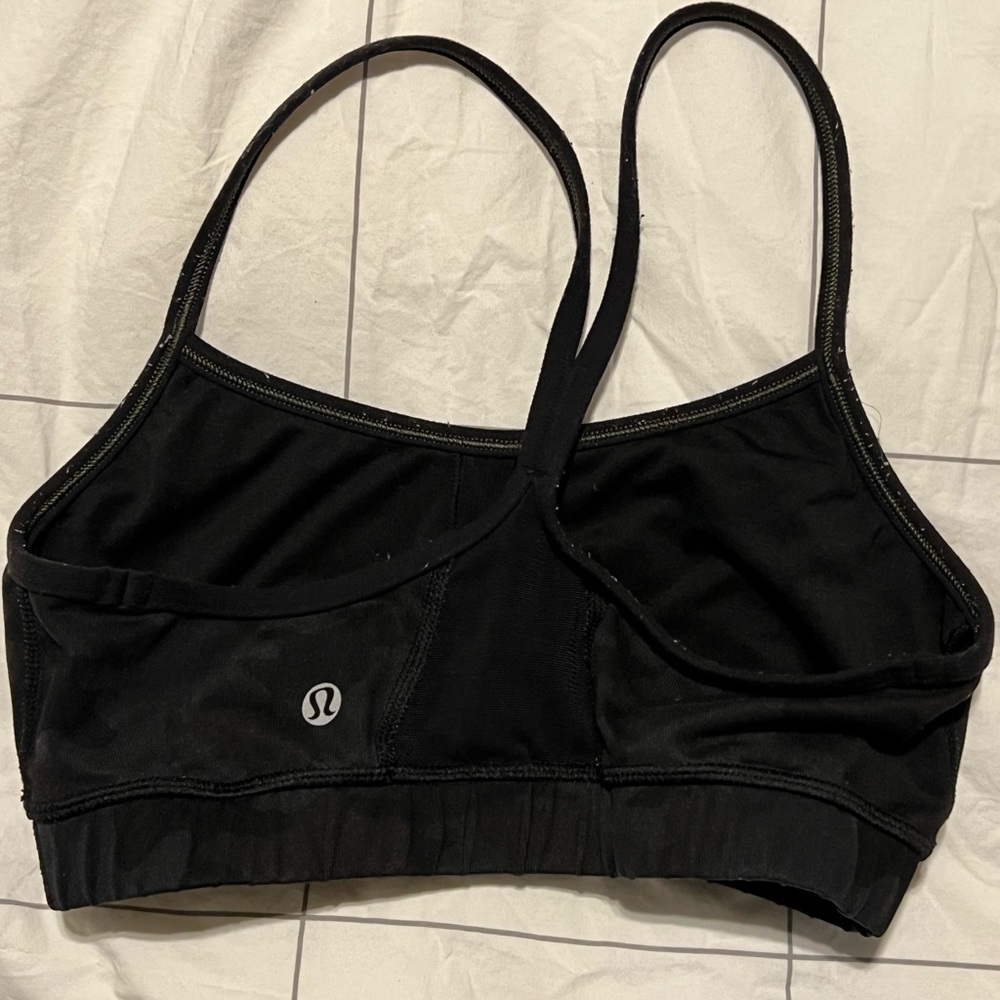 Black Lululemon size 6 sports bra with camo print